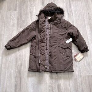 Vintage microfibre winter coat with hood.Still has tags on. Warm and cozy.Sears.